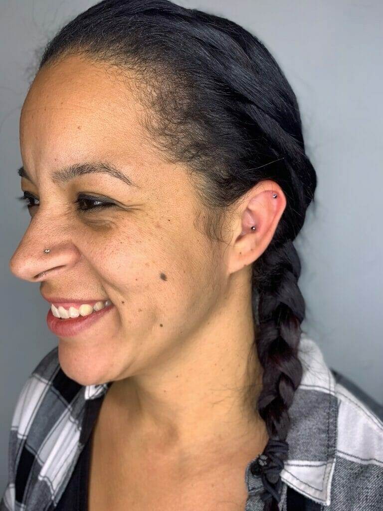 A woman with braided hair.