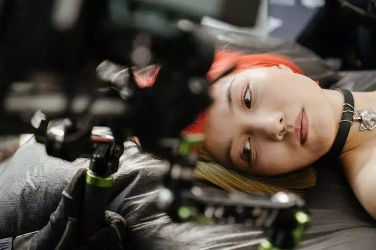 Woman in Black Jacket Lying on the Floor